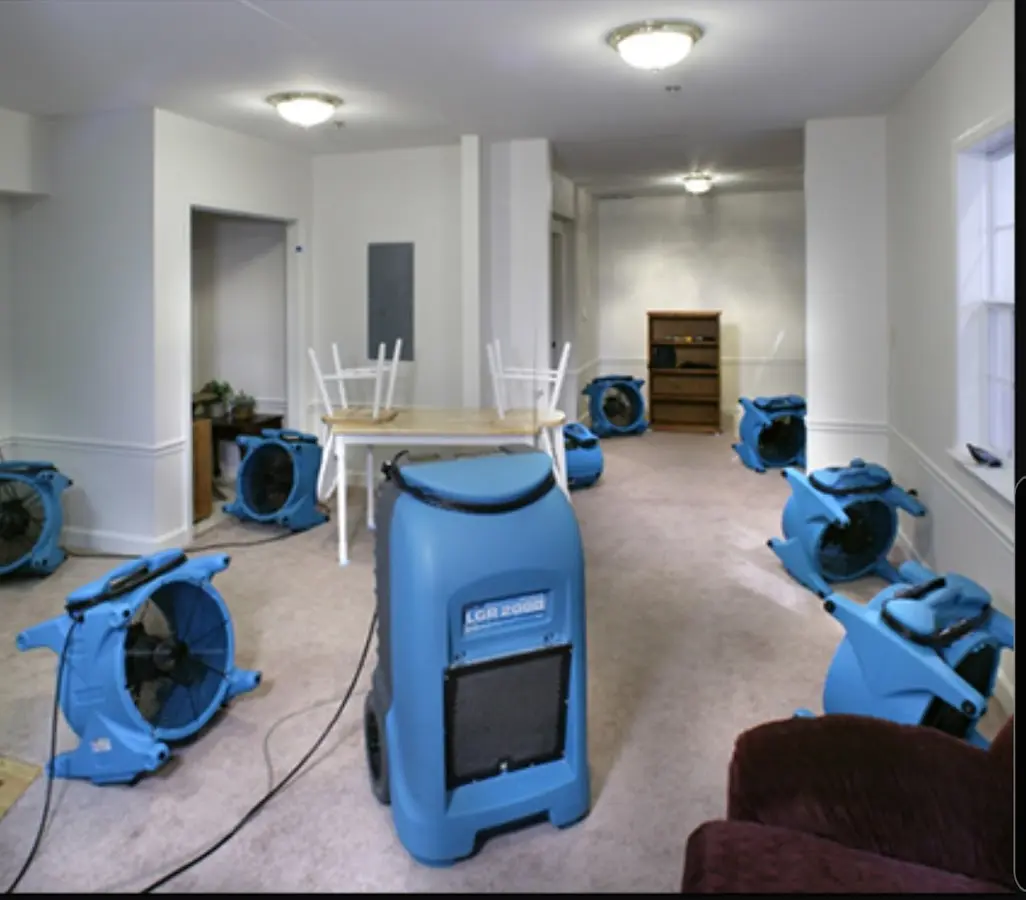 Air movers and dehumidifier setup for Water Damage Restoration in Fitzgerald